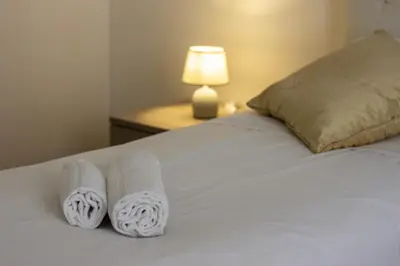 Letto o letti in una camera di Artist Apartment