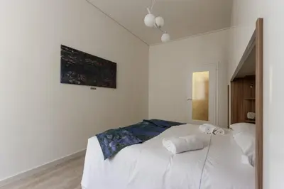 Letto o letti in una camera di Artist Apartment