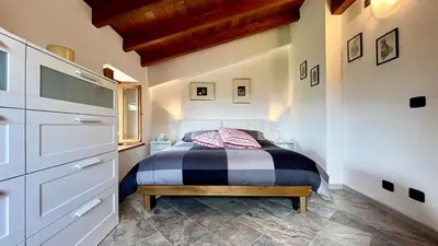 Letto o letti in una camera di PARMA Urzano Case Bosi