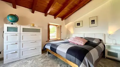 Letto o letti in una camera di PARMA Urzano Case Bosi