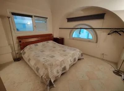 Letto o letti in una camera di Stanza Campori
