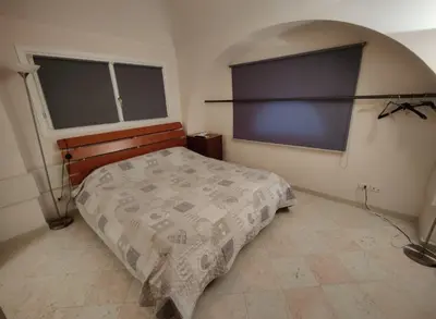 Letto o letti in una camera di Stanza Campori