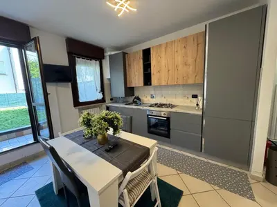 Cucina o angolo cottura di Reggio Emilia Apartments - Giardino - Uno