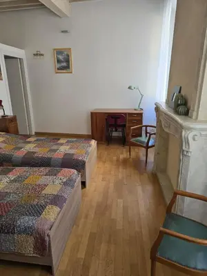 Letto o letti in una camera di GuestHost - Elegant & Bright Flat in Parma Center