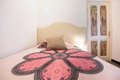 Letto o letti in una camera di 244B - Casa Ludo, Centro Storico,140m dalla Baia del Silenzio PATRIMONIO UNESCO spiaggia e mare