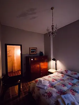 Letto o letti in una camera di Villa Giordani affittacamere Boscoreale