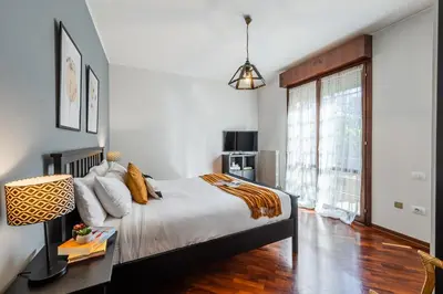Letto o letti in una camera di Modena Garden Retreat, 5 min dal centro con Garage