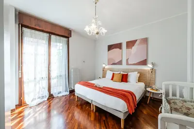 Letto o letti in una camera di Modena Garden Retreat, 5 min dal centro con Garage