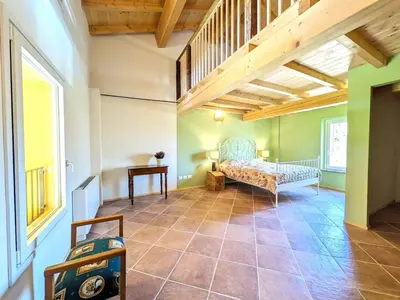 Letto o letti in una camera di CasaRosmarino