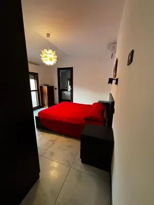Letto o letti in una camera di Modern Apartment with Balcony 2 Bedrooms & 2 Bathrooms near Cremona Fair