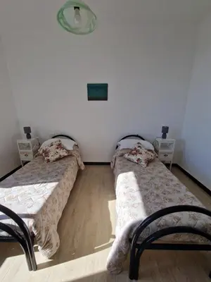 Letto o letti in una camera di Il Paradiso di Adriana