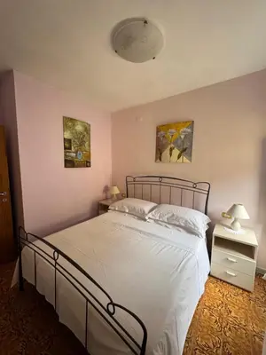 Letto o letti in una camera di Casa di Augusto - Cinque Terre