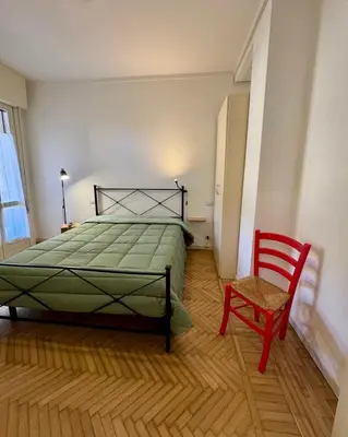 Letto o letti in una camera di Aro's House