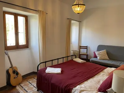 Letto o letti in una camera di Casa del Gelso