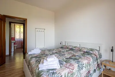 Letto o letti in una camera di Appartamento per 6 persone nella natura - zona collinare residenziale La Spezia - 15 minuti dalla stazione - Val di Vara Trekking 5 Terre