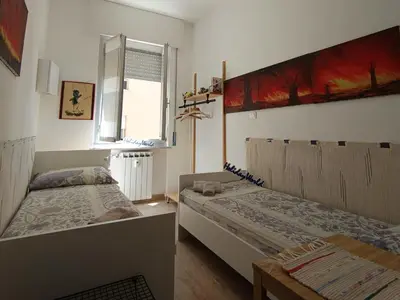 Letto o letti in una camera di Casa le Fontane by Holiday World