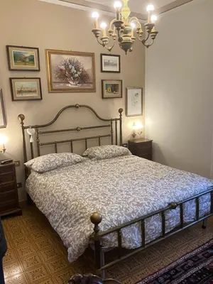 Letto o letti in una camera di Borgo Caprari
