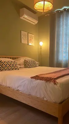 Letto o letti in una camera di Charming mini apartment-CasaNina