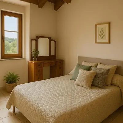Letto o letti in una camera di L'oasi nel borgo, un angolo di pace a Bagnone