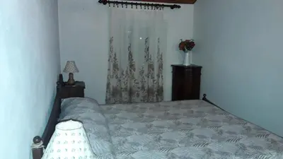 Letto o letti in una camera di Casa Merei