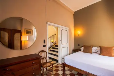Letto o letti in una camera di Castello Canevaro