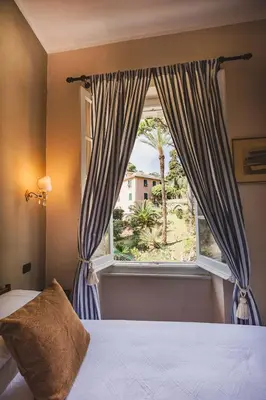 Letto o letti in una camera di Castello Canevaro