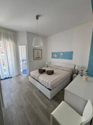 Letto o letti in una camera di Casa La Marina by PortofinoVacanze