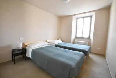 Letto o letti in una camera di Villa Il Circolo Bassone