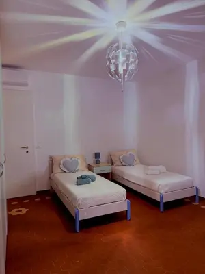 Letto o letti in una camera di Casa Paola