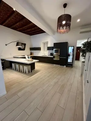 Cucina o angolo cottura di A Casa di Lamu, eleganza in Piazza della Vittoria, 140mq