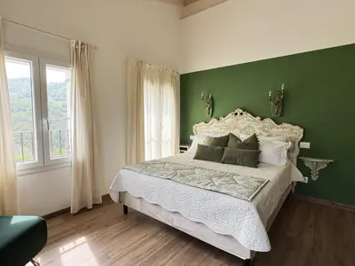 Letto o letti in una camera di La Valle degli Amici
