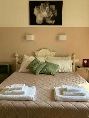 Letto o letti in una camera di La Valle degli Amici