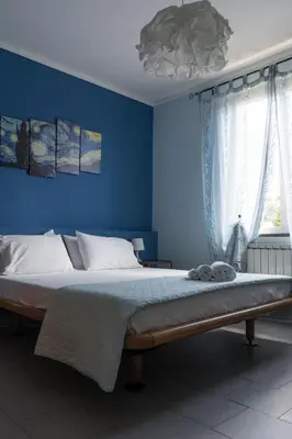 Letto o letti in una camera di B&B La Fontanella