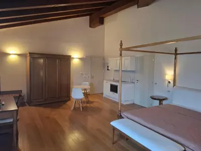 Letto o letti in una camera di Albergo Palazzo Costa