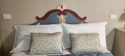 Letto o letti in una camera di Mimma's due