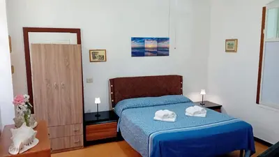 Letto o letti in una camera di Casa Milanesi