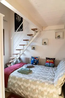 Letto o letti in una camera di Casa Ottilia