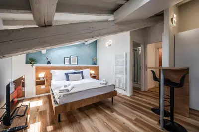 Letto o letti in una camera di Giardini 411 Rooms