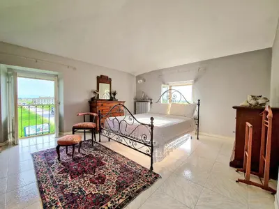 Letto o letti in una camera di Casa Maddalena