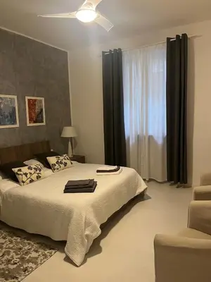 Letto o letti in una camera di Campesio 2 , Zona Clinica Piacenza