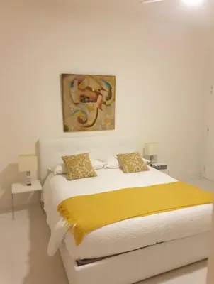 Letto o letti in una camera di Campesio 2 , Zona Clinica Piacenza