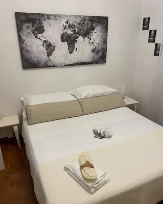 Letto o letti in una camera di La Casa Bianca by M&G