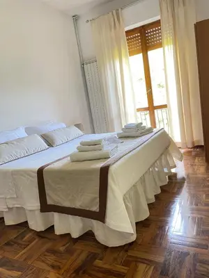 Letto o letti in una camera di IL NIDO by M&G Holiday Home