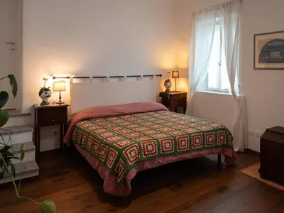 Letto o letti in una camera di La Casetta
