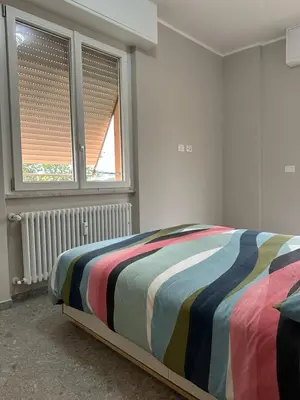 Letto o letti in una camera di Casa Itaca