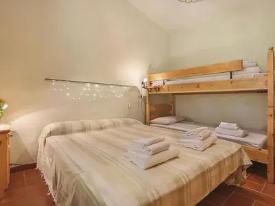 Letto o letti in una camera di Holiday Home Al Faggio - GLL120 by Interhome
