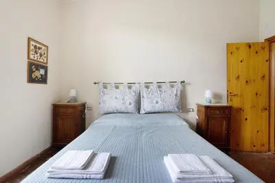 Letto o letti in una camera di AGRIFOGLIO - Palazzo Ravaschieri