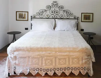Letto o letti in una camera di Pietra Corva - Monticello Apartments