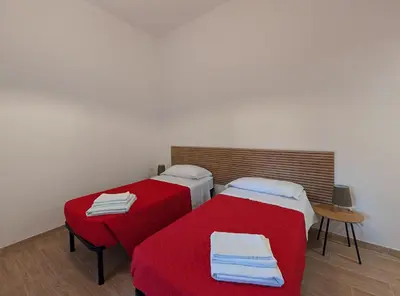 Letto o letti in una camera di Casa Francesca
