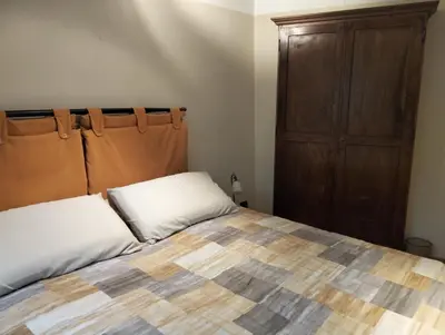 Letto o letti in una camera di R&B Piccolo Borgo Tralacosta